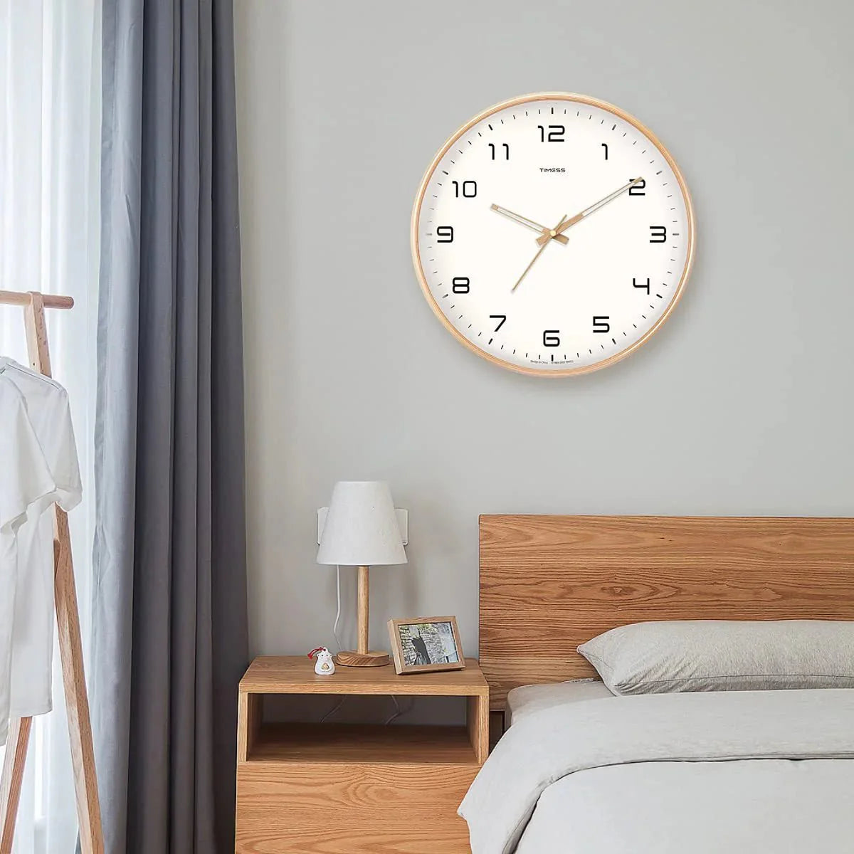 https://cdn.shopify.com/s/files/1/0655/0464/1076/files/timelesswood-solid-wood-analog-wall-clock-with-minimalist-design-583470.webp?v=1773243192
