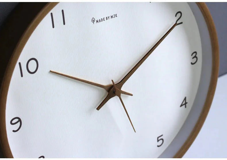 https://cdn.shopify.com/s/files/1/0655/0464/1076/files/timelesswood-solid-wood-analog-wall-clock-with-minimalist-design-749691.webp?v=1773243192
