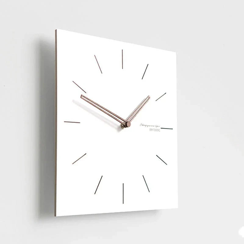 https://cdn.shopify.com/s/files/1/0655/0464/1076/files/white-quadrangle-wall-clock-minimalist-eco-friendly-design-445623.webp?v=1773243431