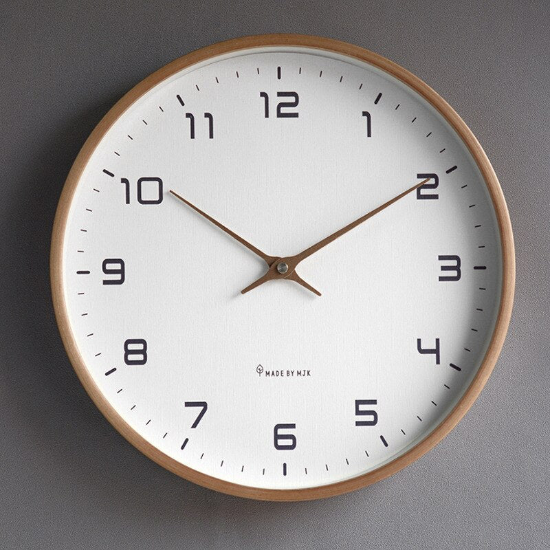 https://cdn.shopify.com/s/files/1/0655/0464/1076/files/wooden-wall-clock-scandinavian-minimalist-design-color-brown-from-the-front.jpg?v=1758233920