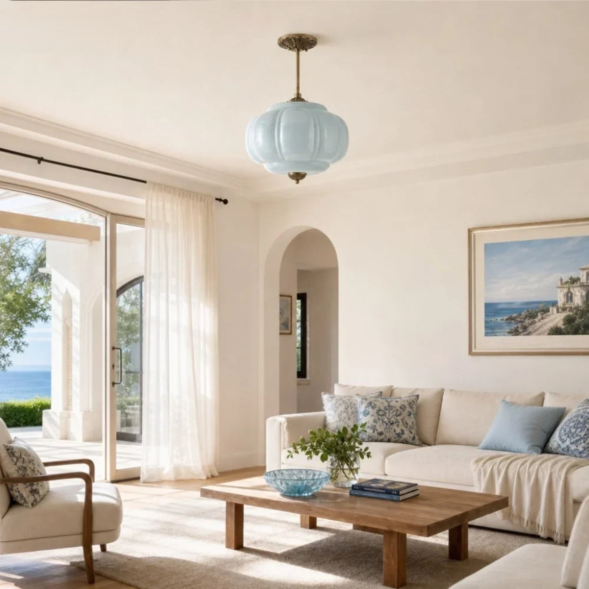 Blue fluted glass semi-flush pendant in a bright coastal living room